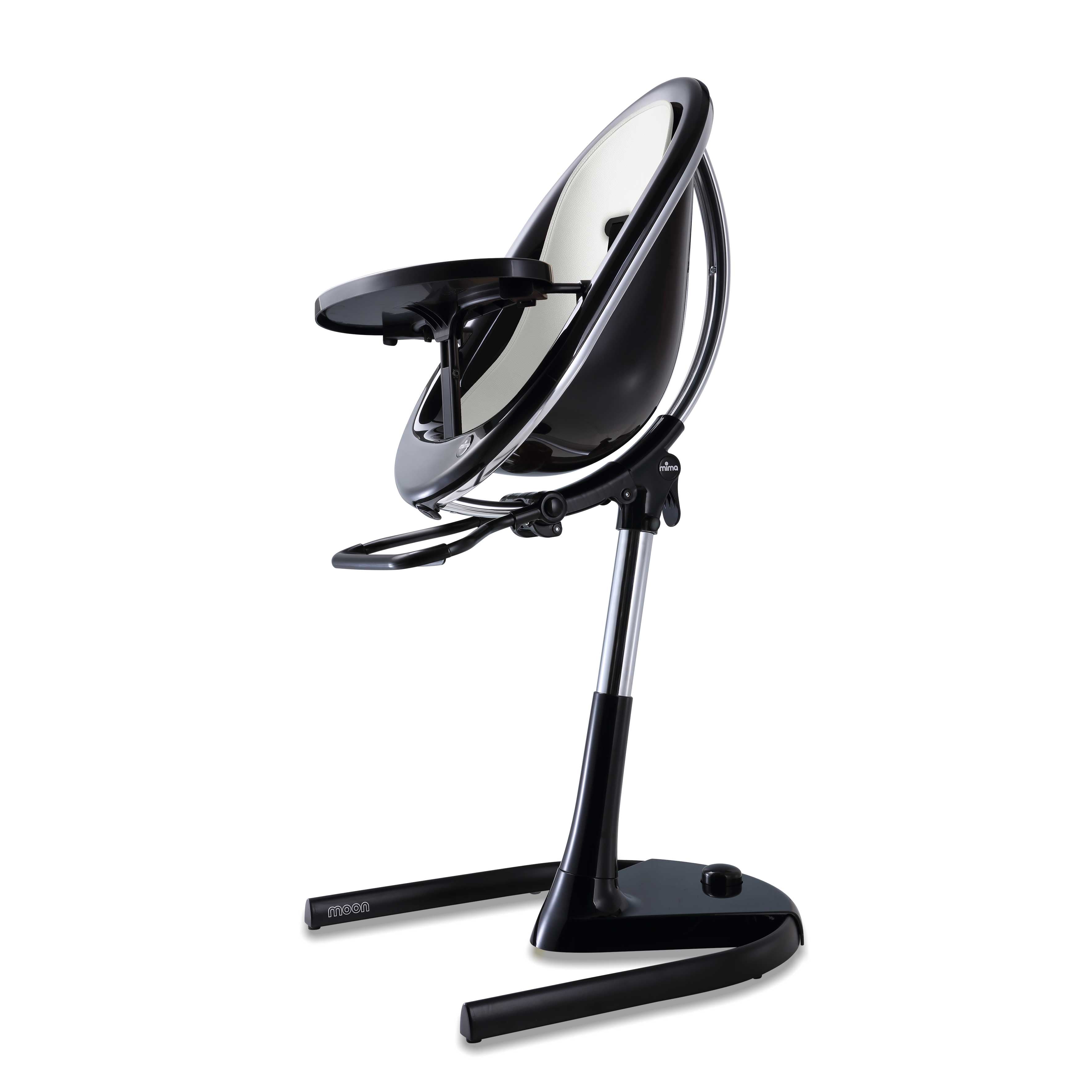 Black Mima Moon 2G high chair with snow white seat pad, side view, modern with transparent back