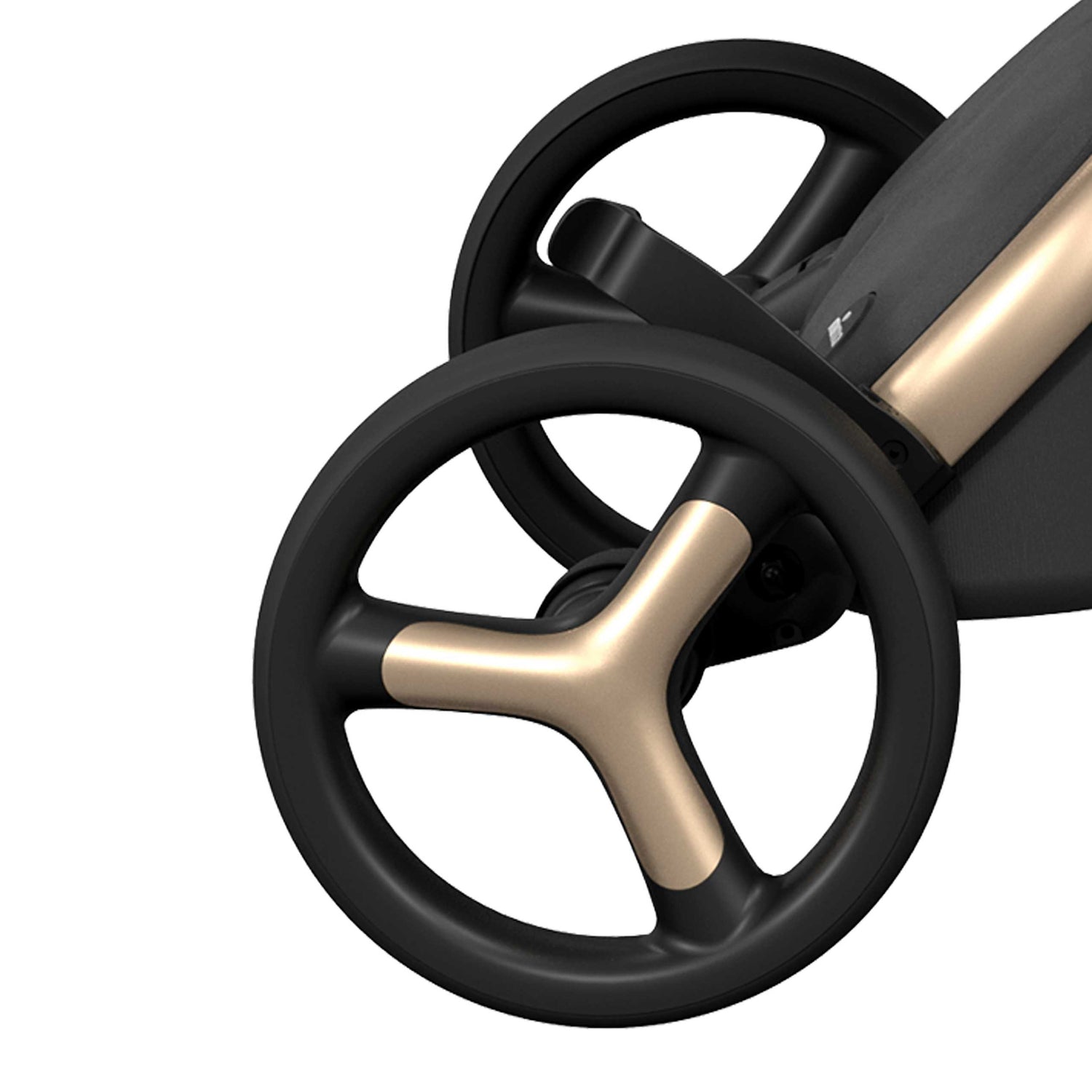 Close-up of Mima® Xari Max Black & Gold Special Edition Stroller wheels, highlighting the stylish gold wheel caps and sturdy black design, perfect for a luxurious urban stroller experience.