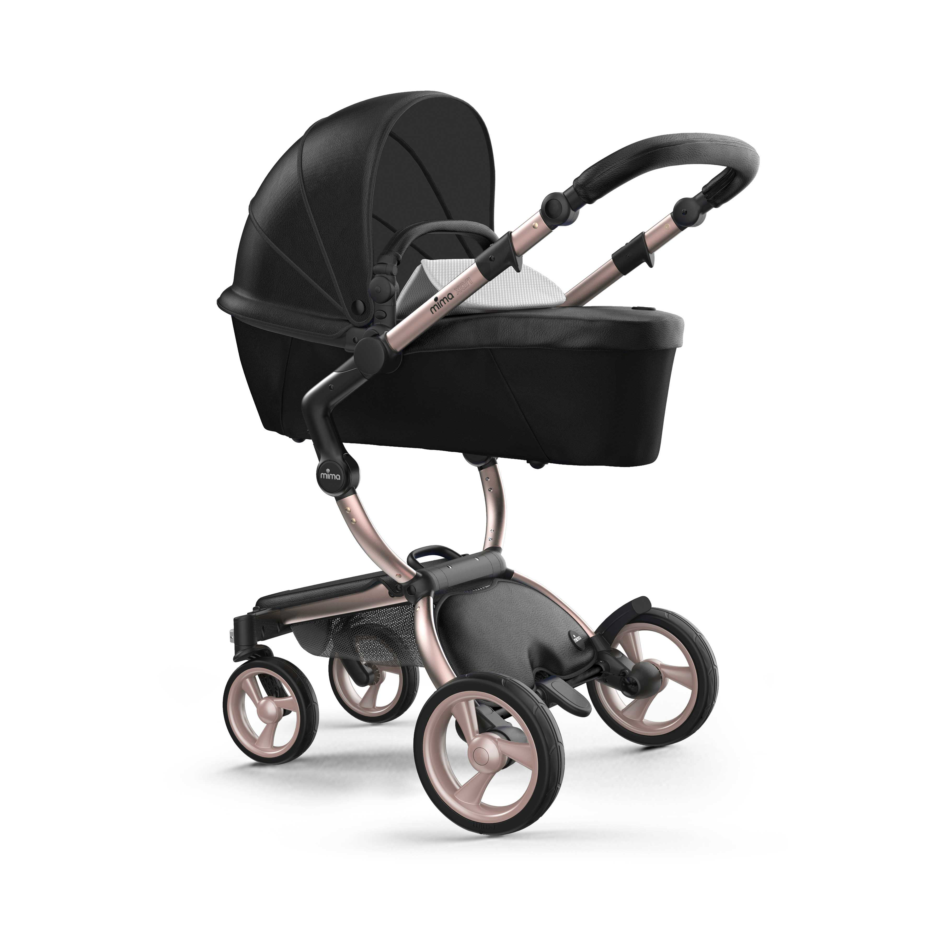 mima Xari stroller with bassinet, in rose gold chassis and stone white starter pack, left front view, durable with ample storage