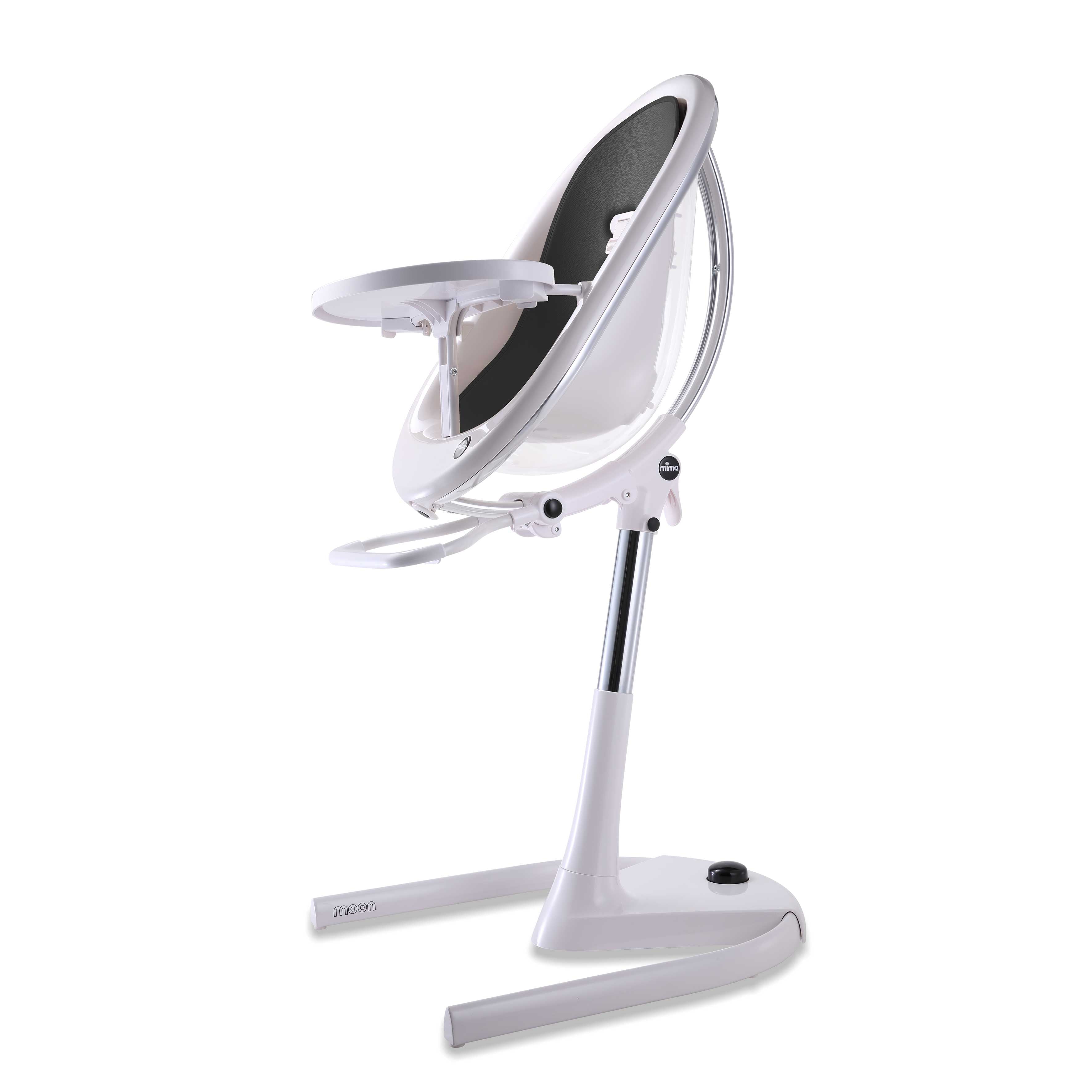 White Mima Moon 2G high chair with black seat pad, side view, modern with transparent back