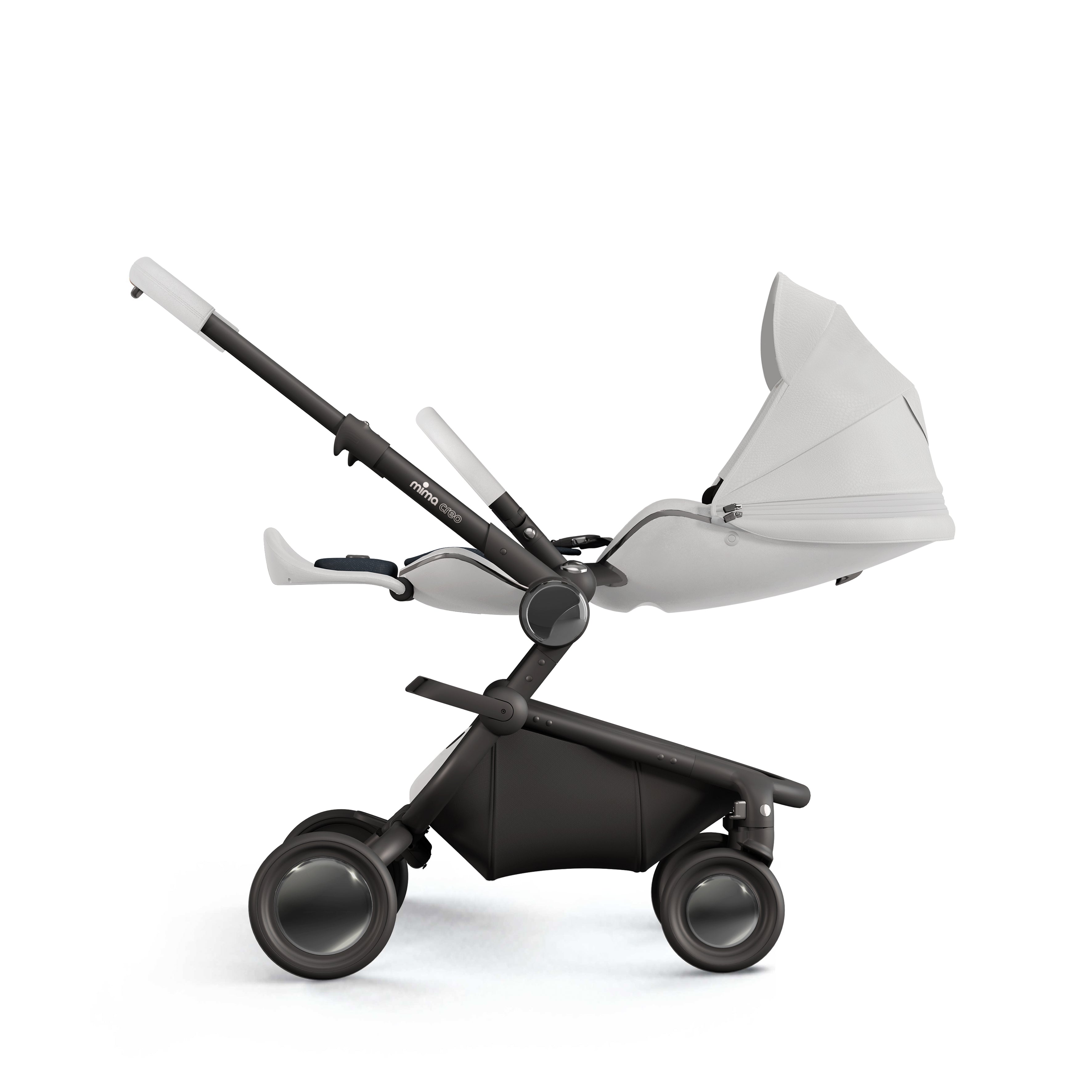 mima creo stroller in white with seat fully reclined into a flat position, side view, facing parents