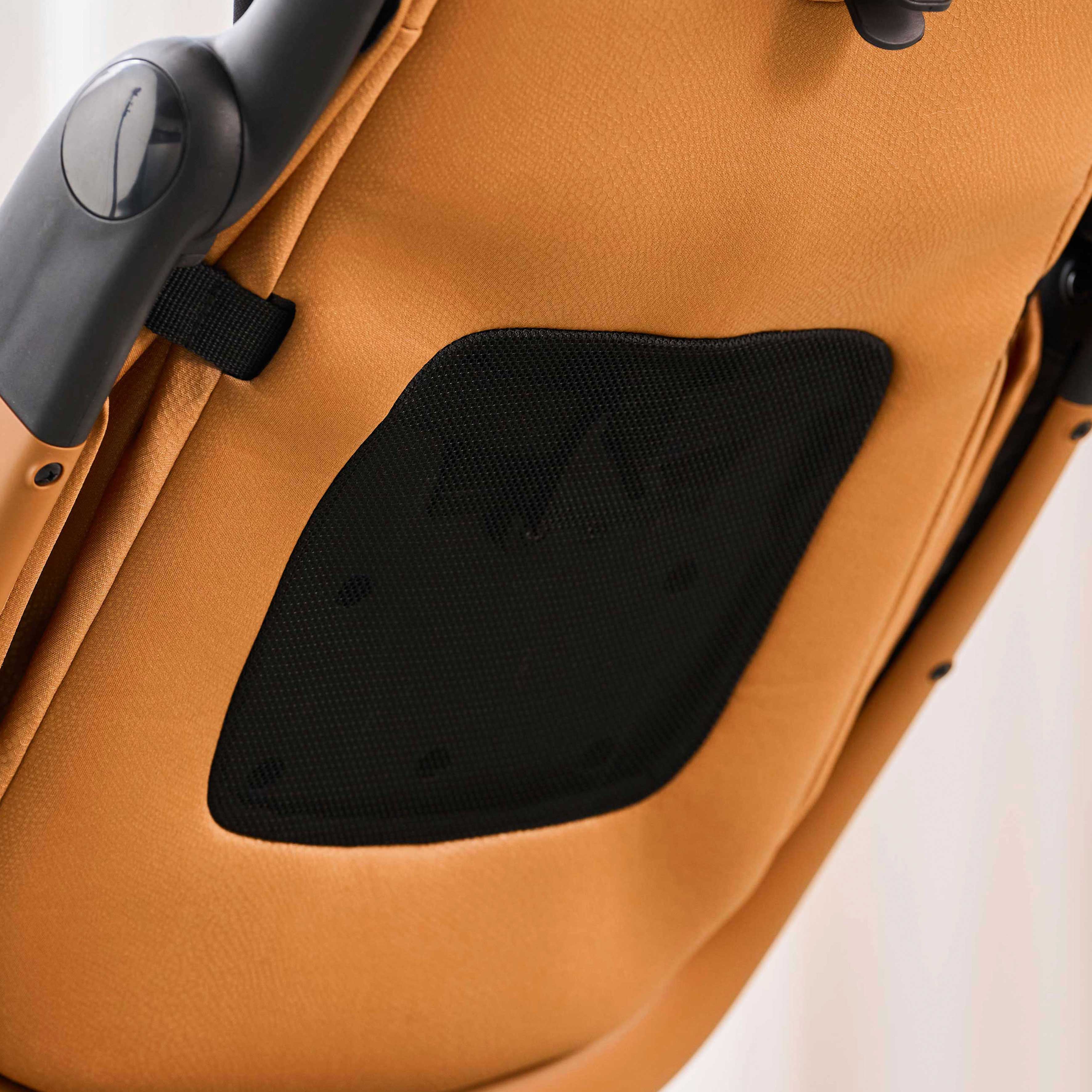 close up of backrest mesh ventilation on miro compact stroller in mocha cream