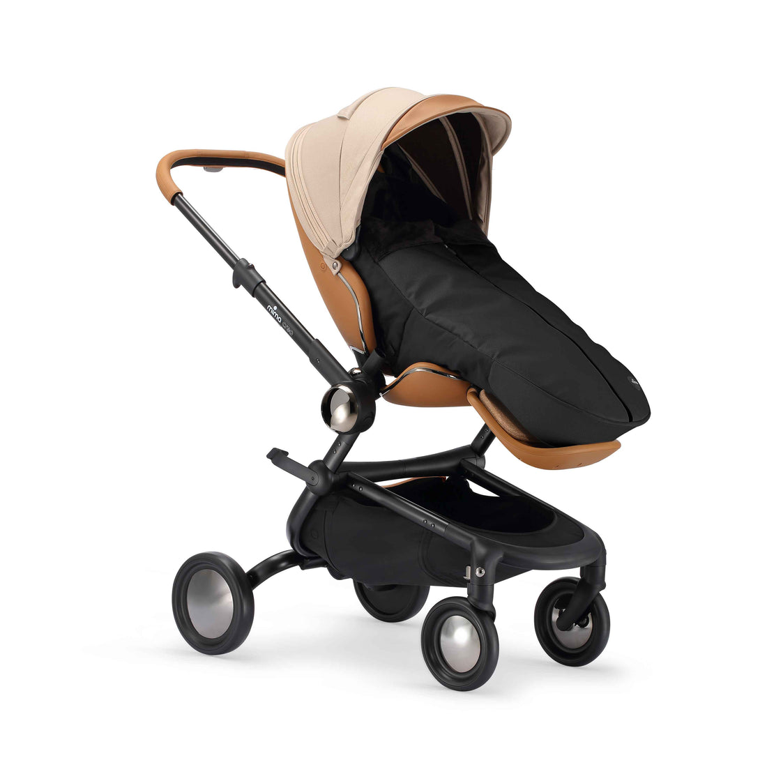 mima creo stroller equipped with winter footmuff in black, angled view
