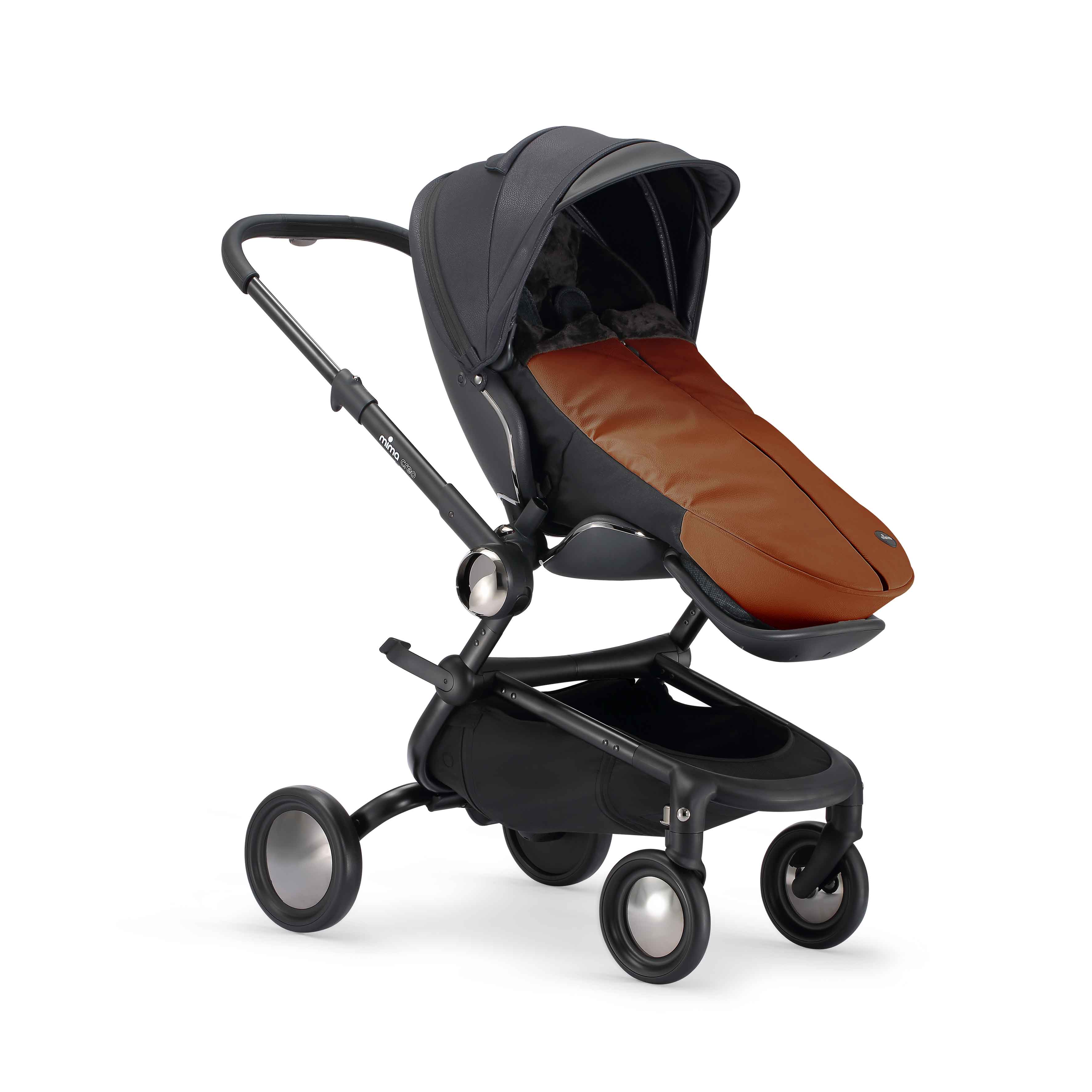 angled view of mima creo stroller featuring winter footmuff in camel
