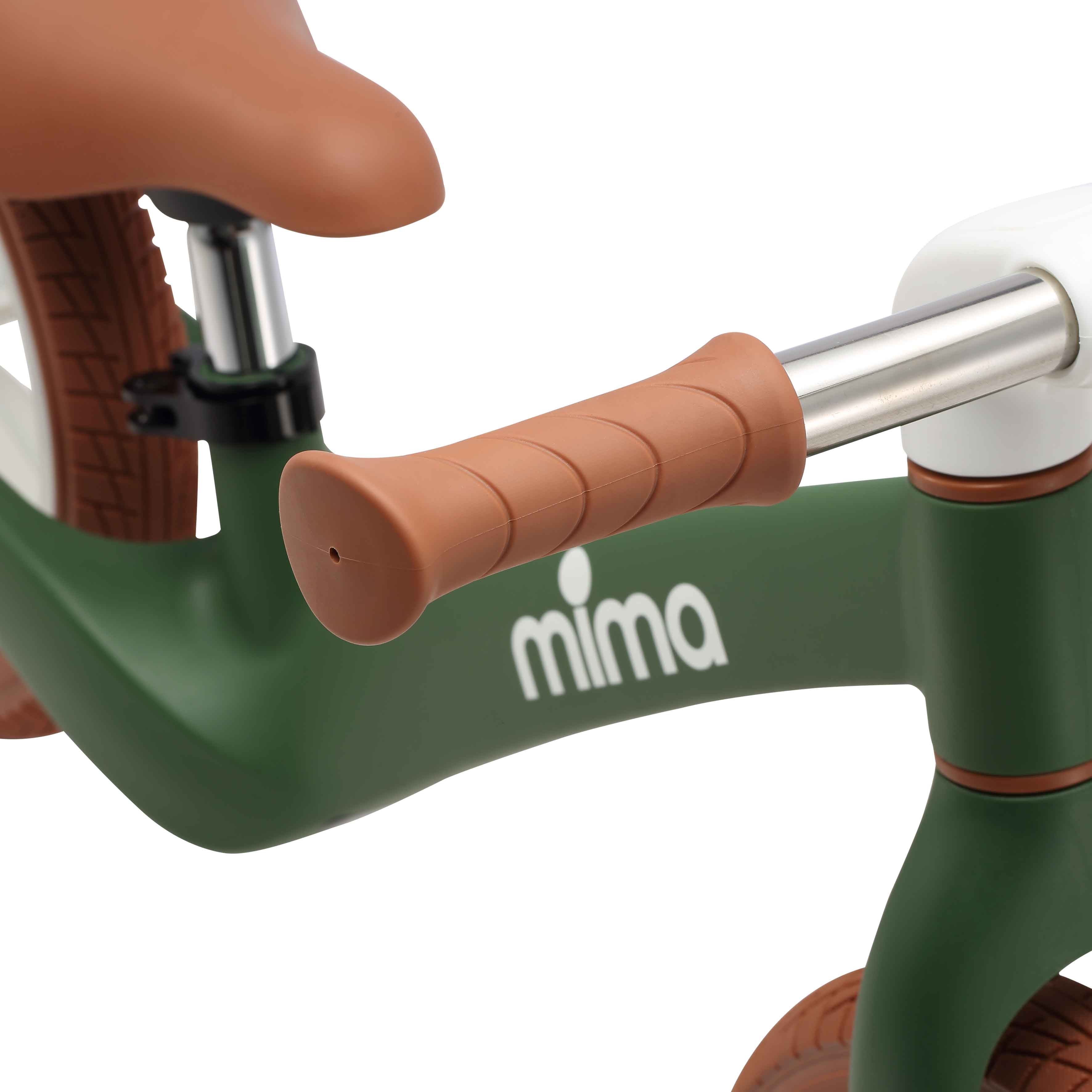 detailed view of the handlebar grip and logo on mima zoom lite in green