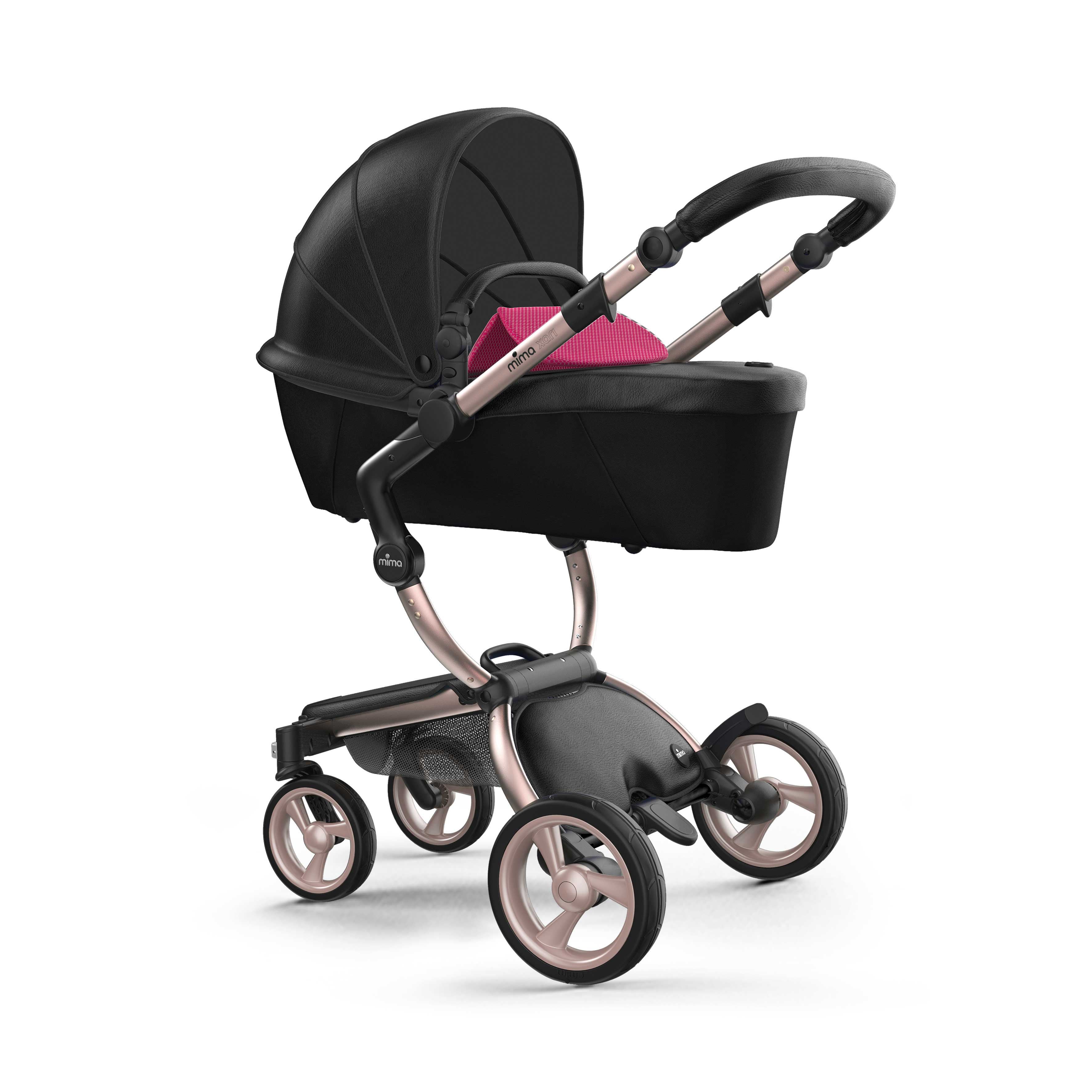 mima Xari stroller with bassinet, in rose gold chassis and Hot Magenta starter pack, left front view, durable with ample storage