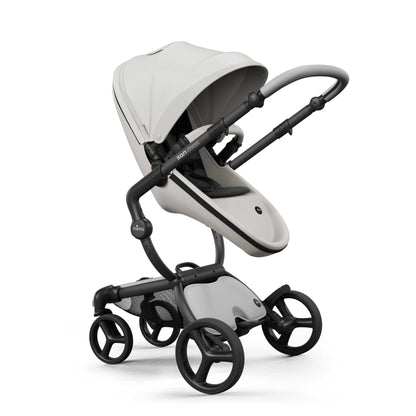mima® xari max stroller, in black chassis, snow white seat and black seat pad, with canopy and safety bar, facing parents, left front-angle view, Mom&