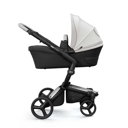 mima® xari max bassinet with white canopy, side view product display 