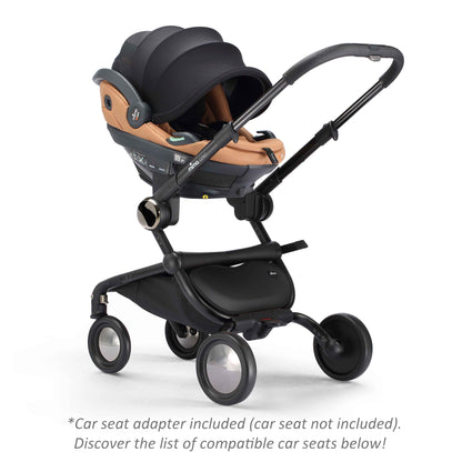mima creo stroller in black with attached car seat, angled view 