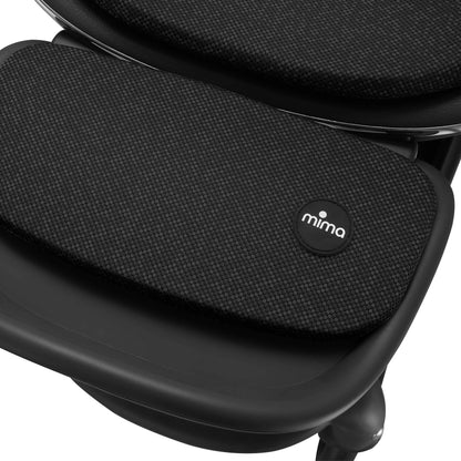 mima creo stroller footrest detail in black showing fabric texture 