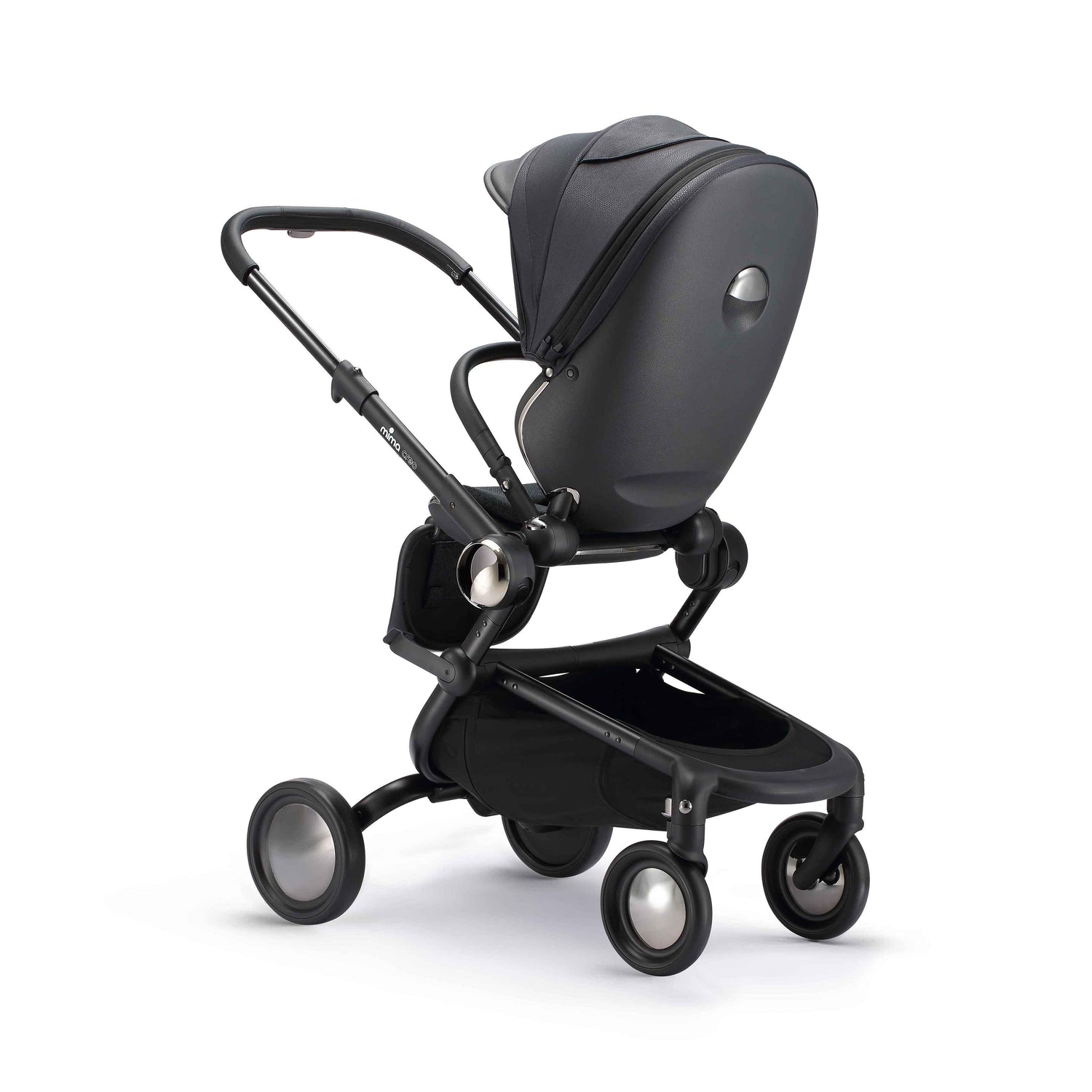 rear angled view of parent facing mima creo stroller in black 