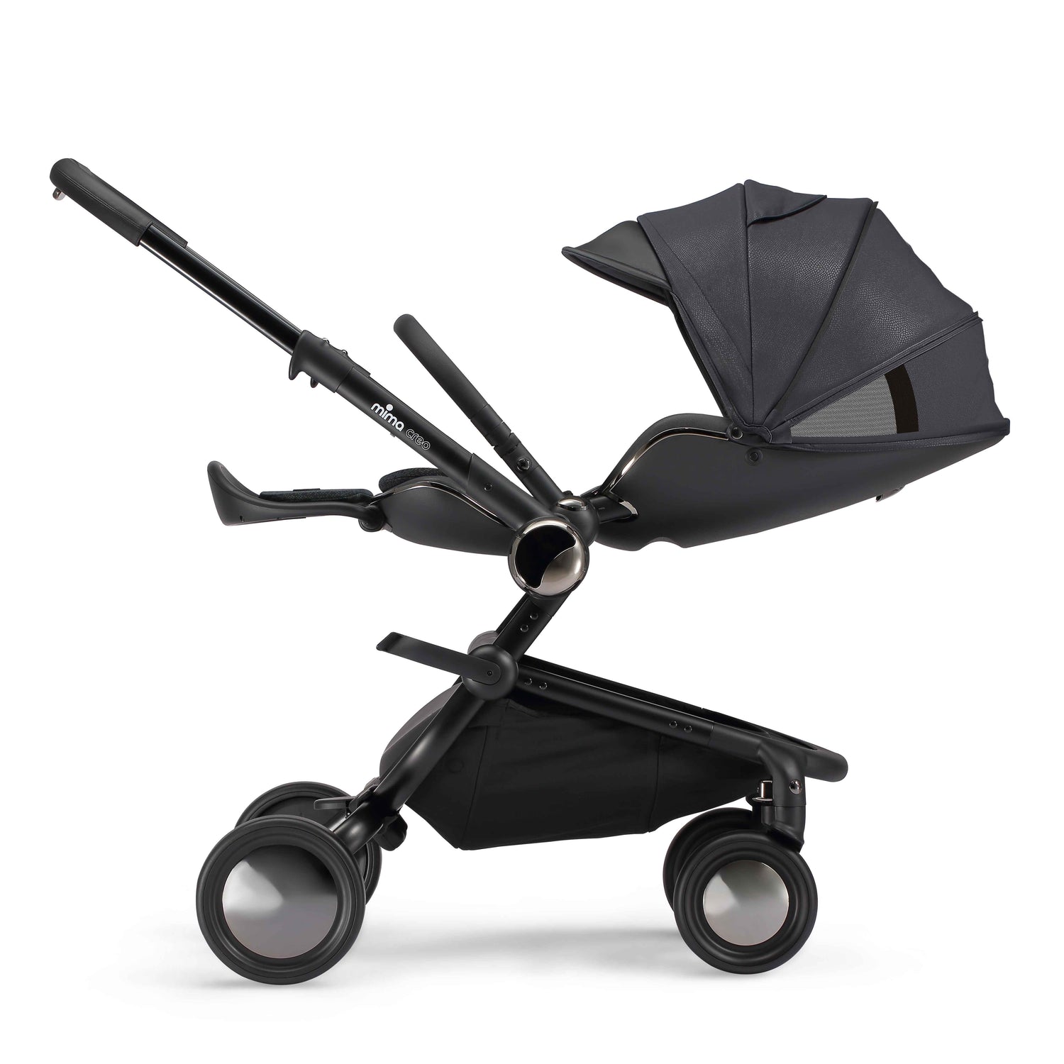 side view of parent facing fully reclined mima creo compact stroller in black 