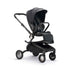 angled view of mima creo stroller in black 
