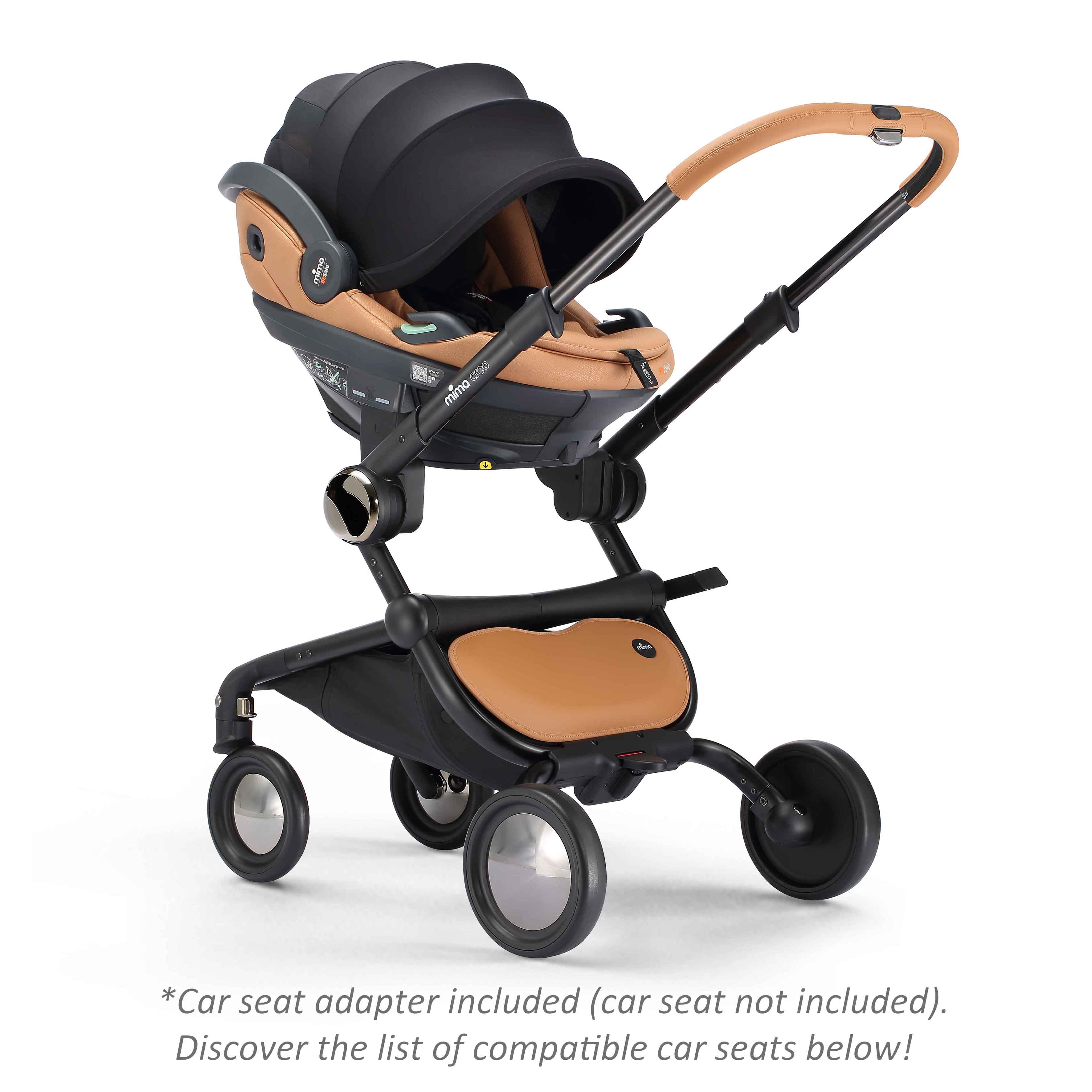 mima creo stroller in mocha cream with attached infant car seat, angled view 