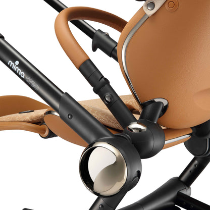detailed view of the frame joint and trim on mima creo in mocha cream 