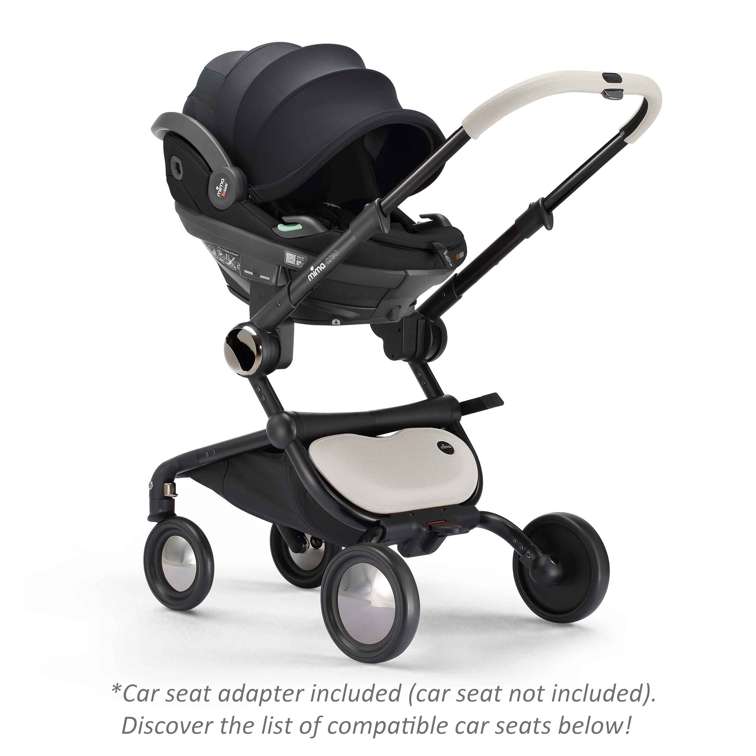 mima creo stroller in white with attached car seat, angled view 