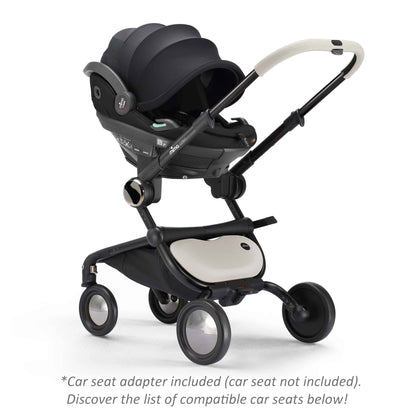 mima creo stroller in white with attached car seat, angled view 