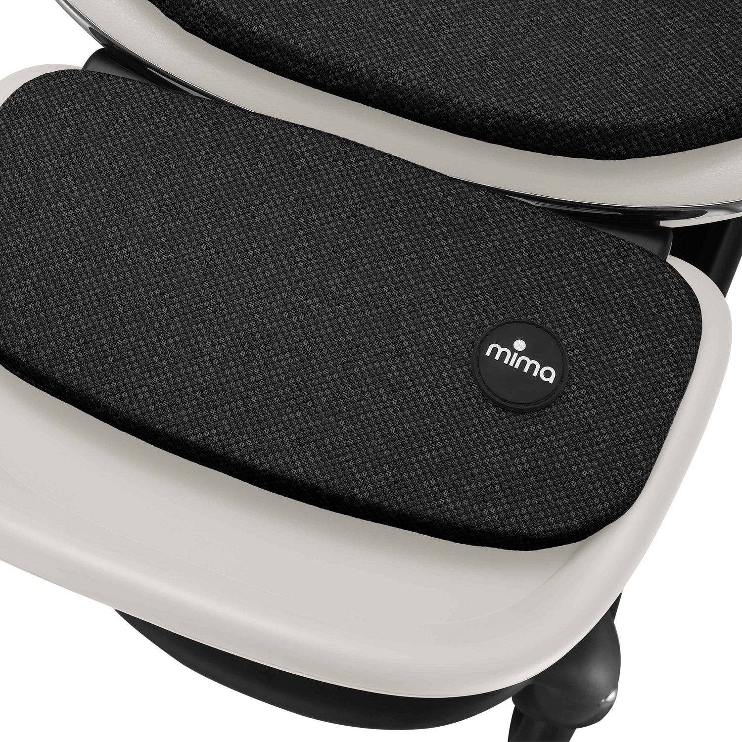 mima creo stroller footrest detail in white showing fabric texture 