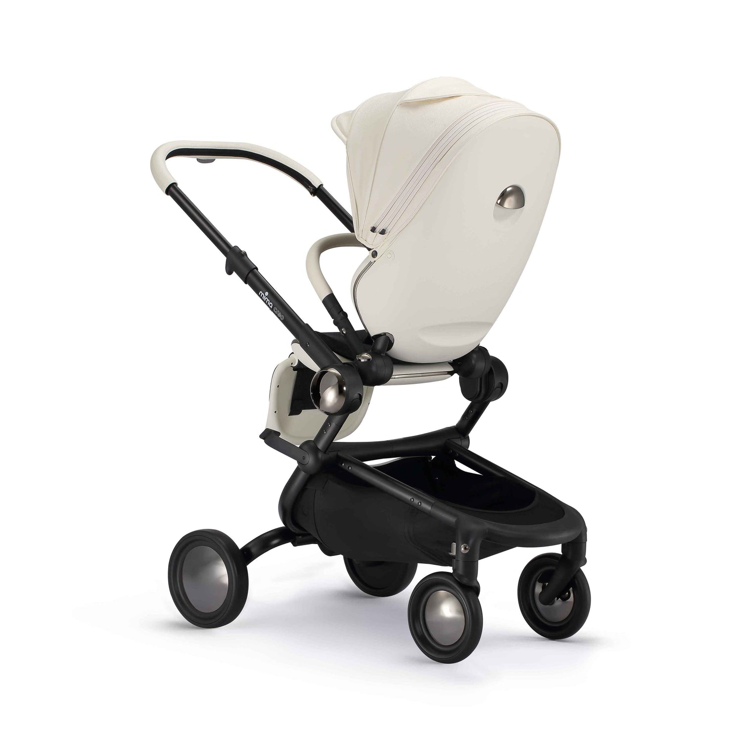 rear angled view of parent facing mima creo stroller in white 