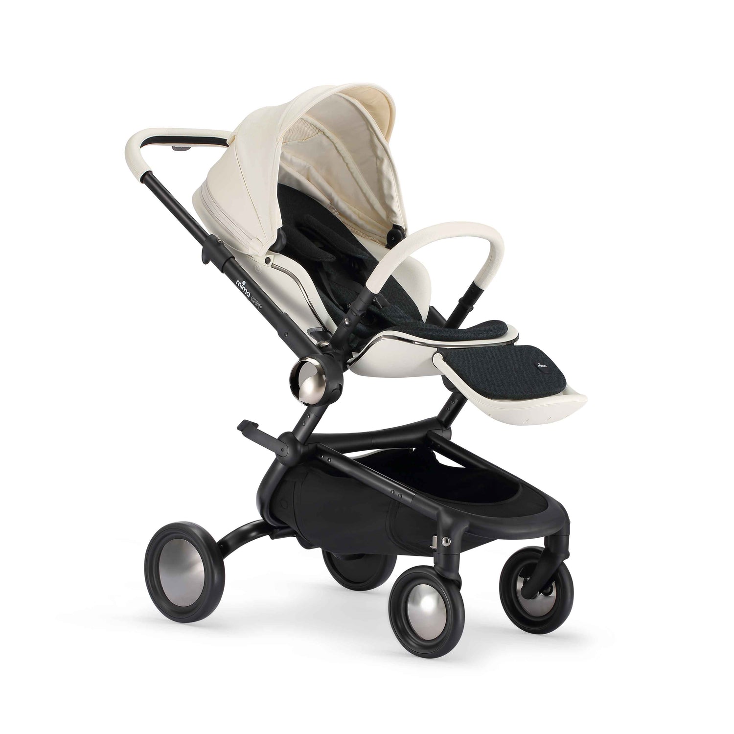 semi reclined mima creo compact stroller in white, angled view 