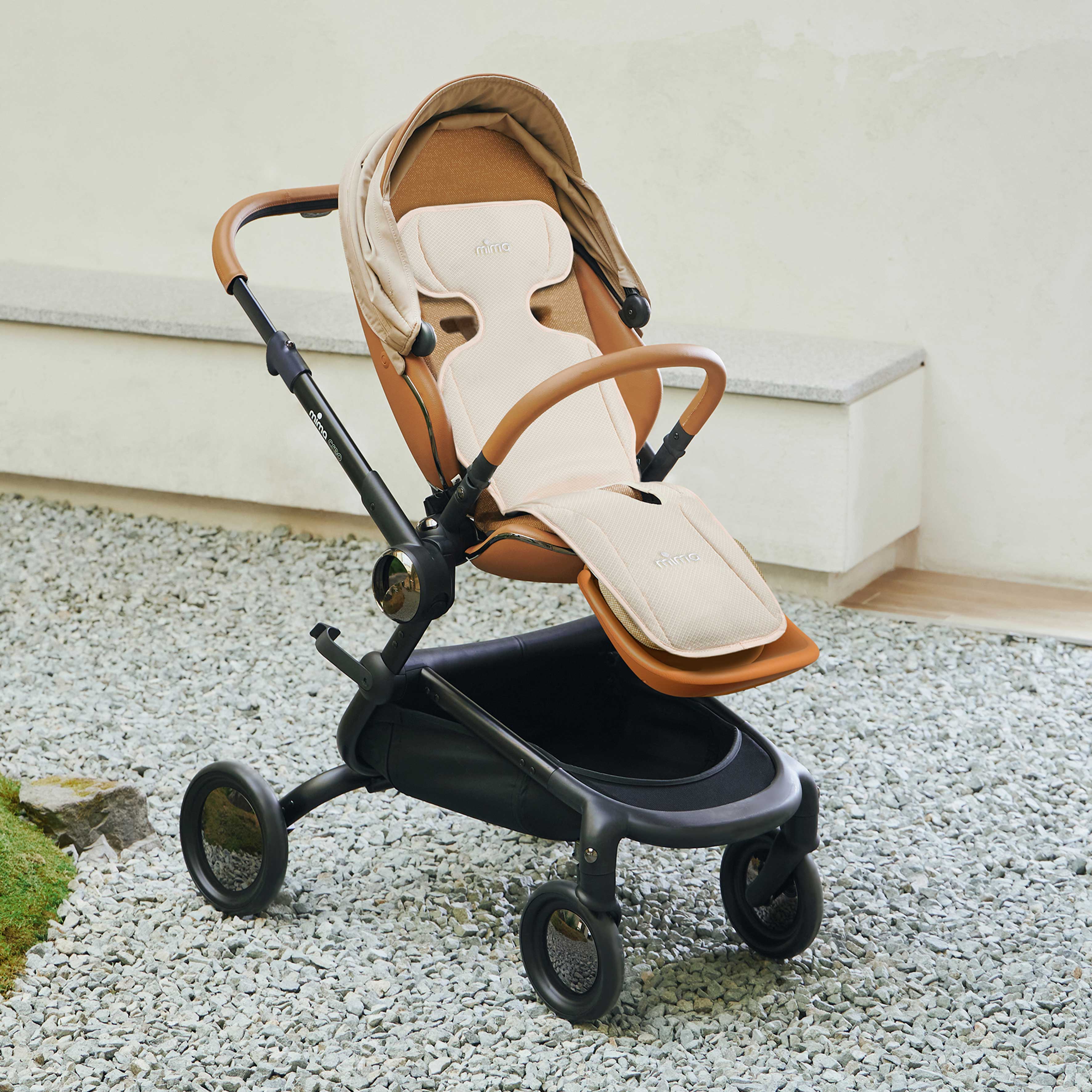 Mima® Flo Donut baby cooling seat pad installed on stroller seat 