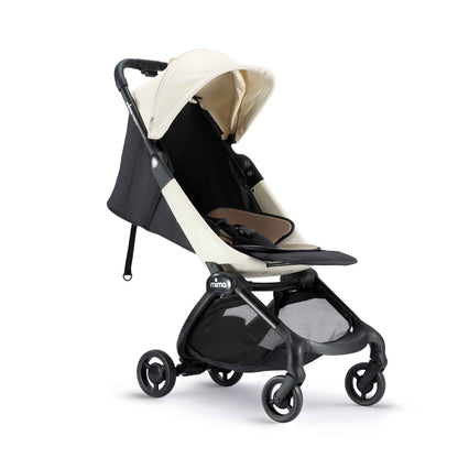 mima miro compact travel stroller in white with dark reclined seat and shadow, angled view 