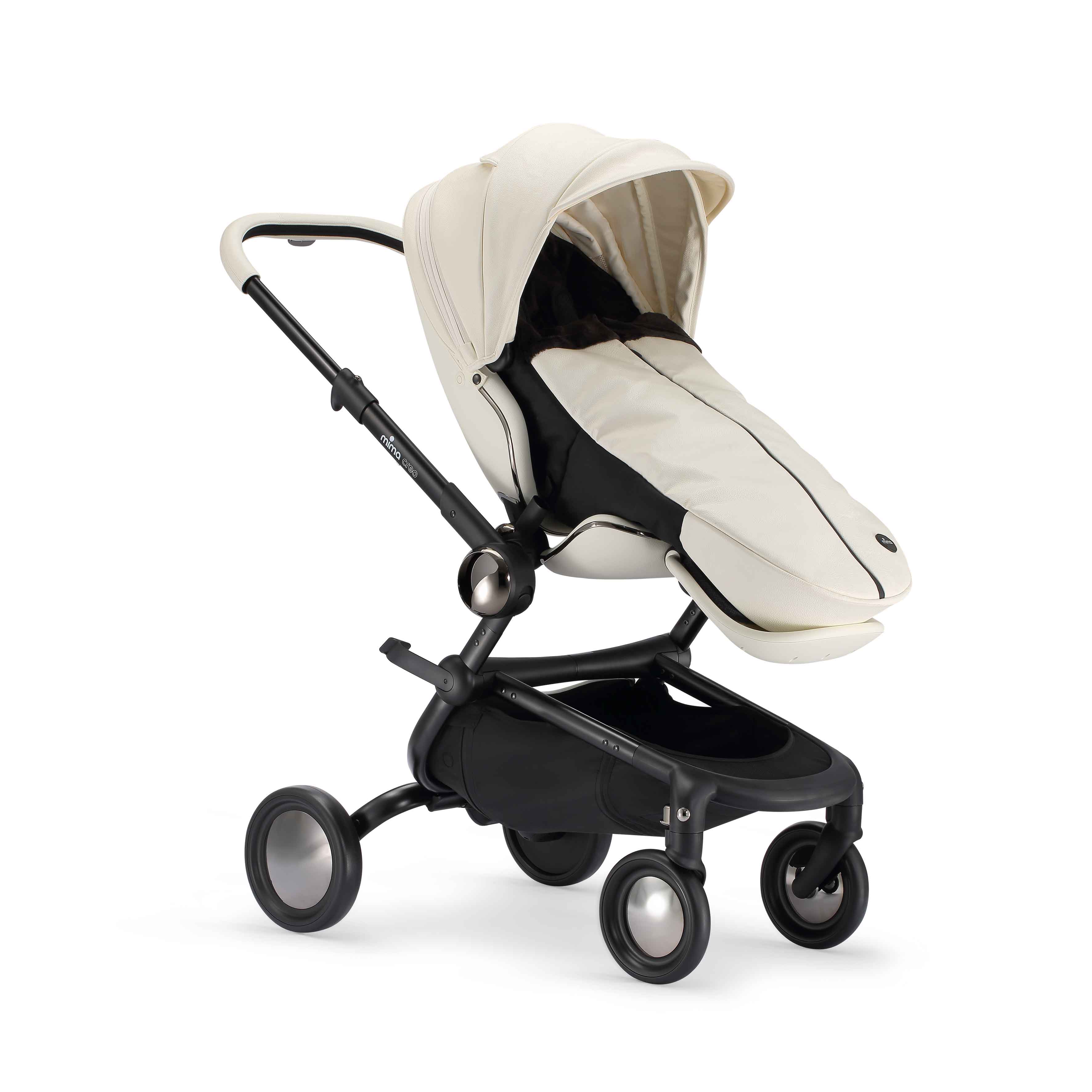 mima winter footmuff in snow white installed on mima creo stroller, angled view
