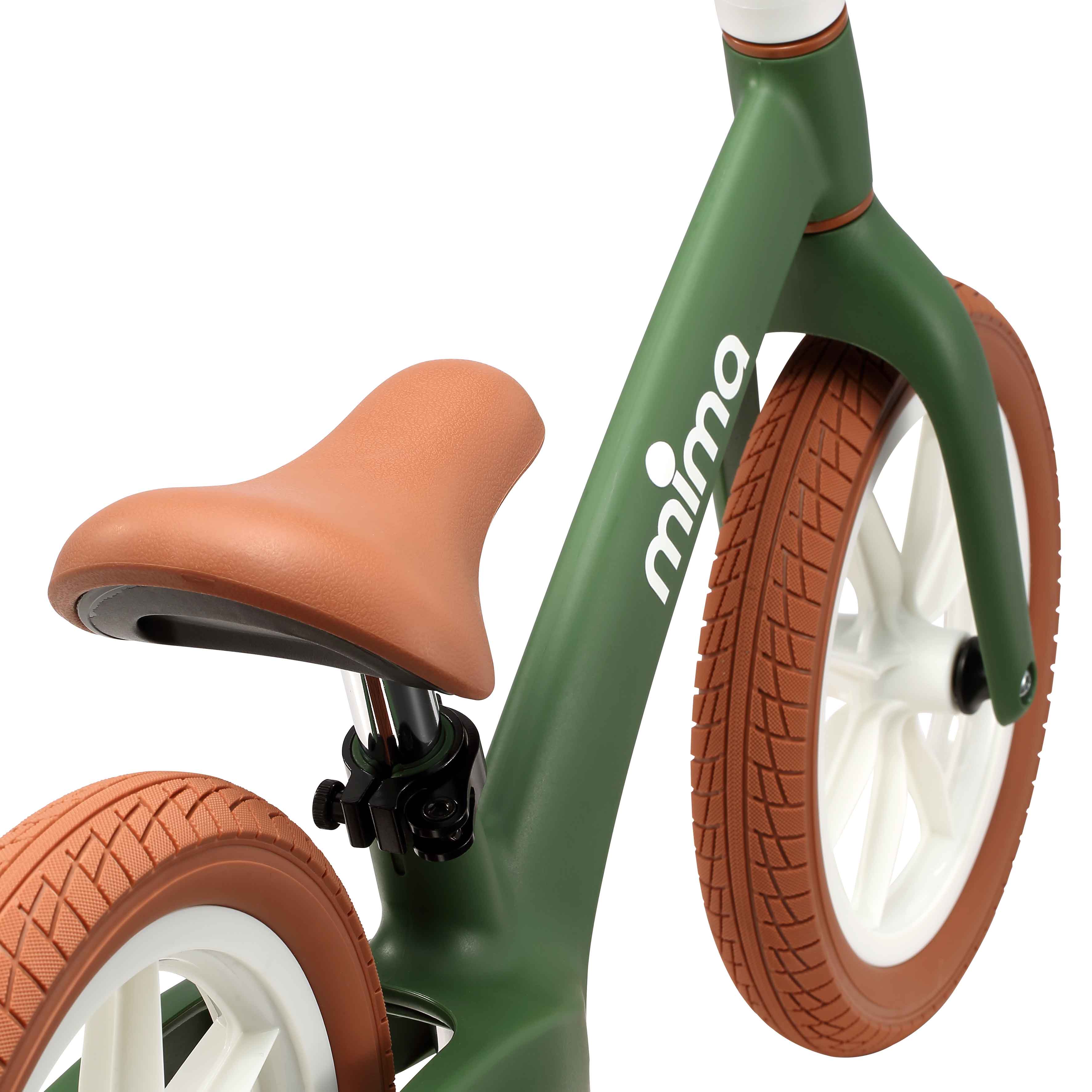 close up of the seat saddle on mima zoom lite balance bike in green 