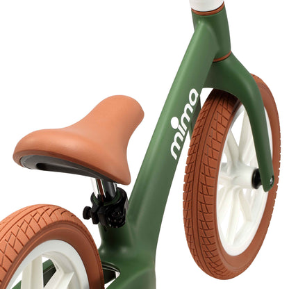 close up of the seat saddle on mima zoom lite balance bike in green 