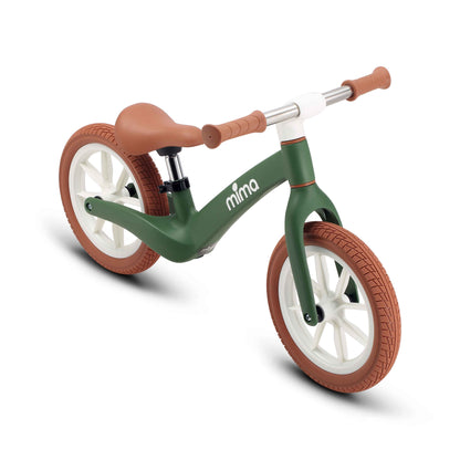 side view of mima zoom lite balance bike in green with high seat 