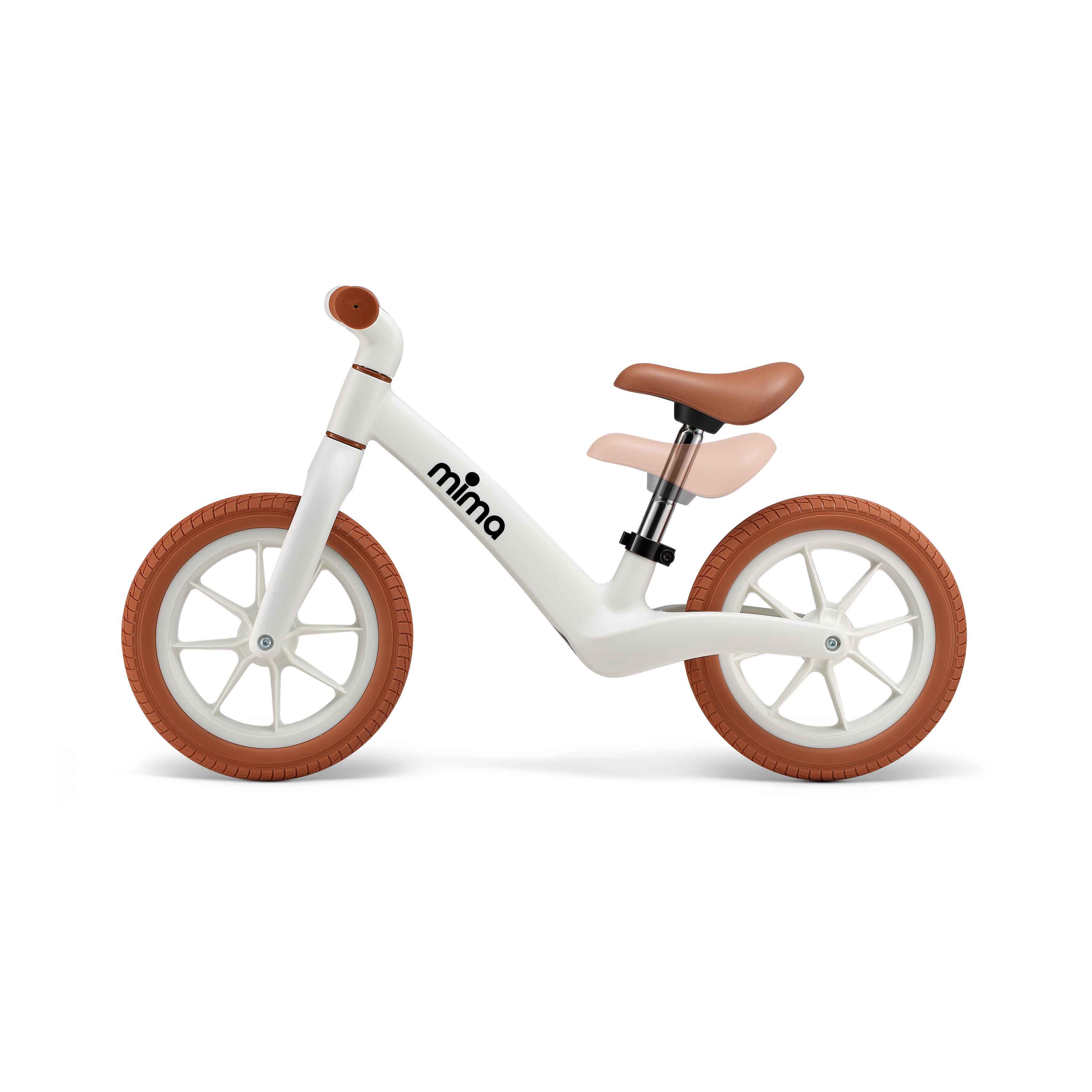 side view of mima zoom lite balance bike in white showing adjustable seat height with faded overlay 