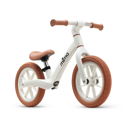 mima zoom lite balance bike in white featuring low seat, side profile 